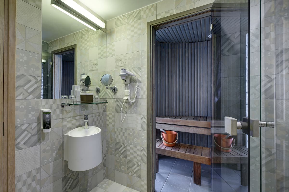 suite | bathroom | shower, hair dryer, bathrobes, heated floors