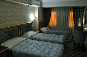 Economy Triple Room | Premium bedding, minibar, in-room safe, desk - Grand Hisar Hotel (Istanbul)