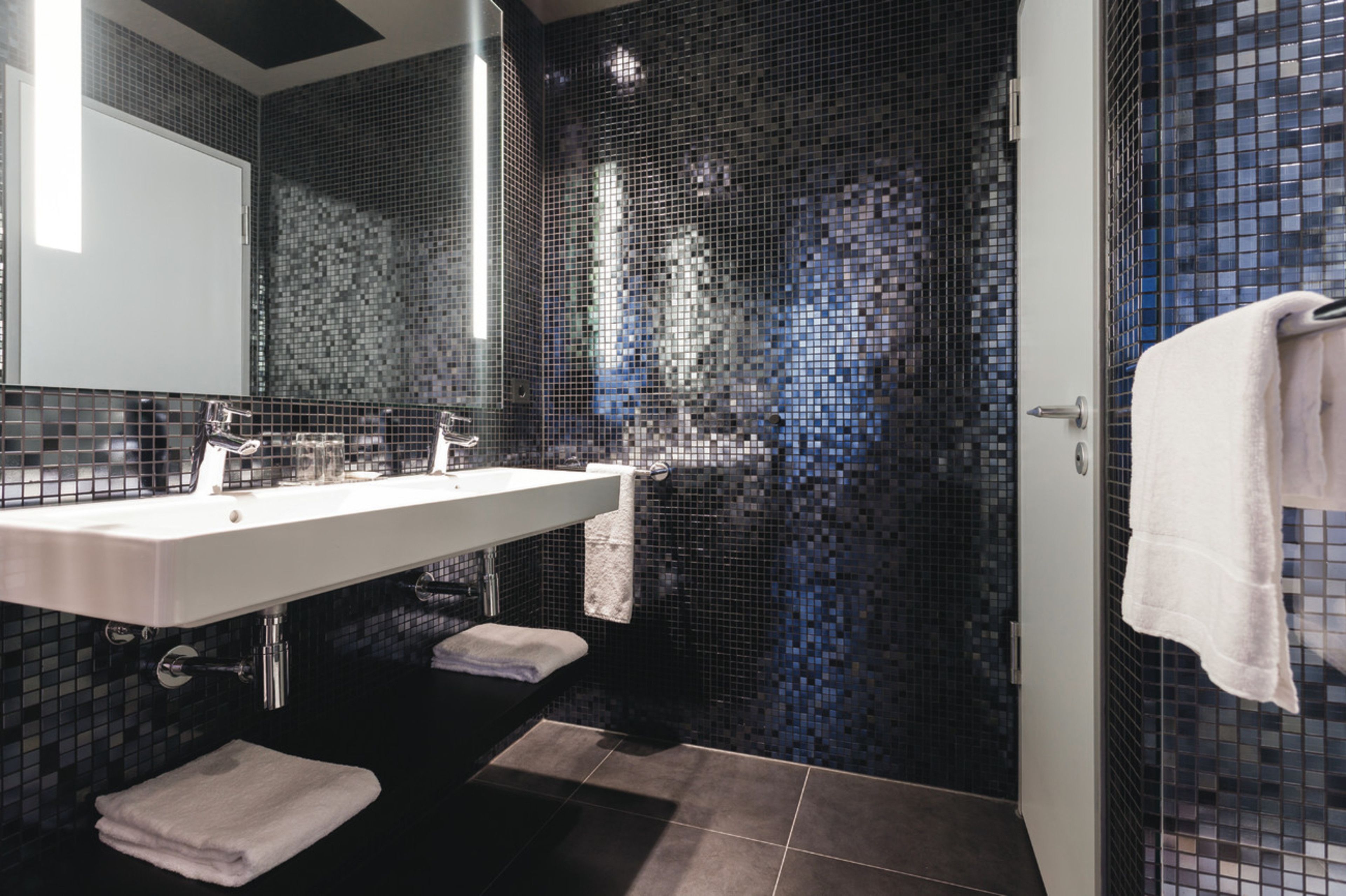 shower, eco-friendly toiletries, hair dryer, towels