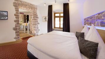 Ropa de cama de alta calidad y minibar