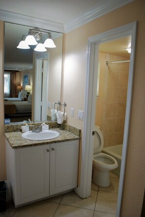 Villas (Across the street from the beach) | Bathroom | Combined shower/tub, free toiletries, hair dryer, towels