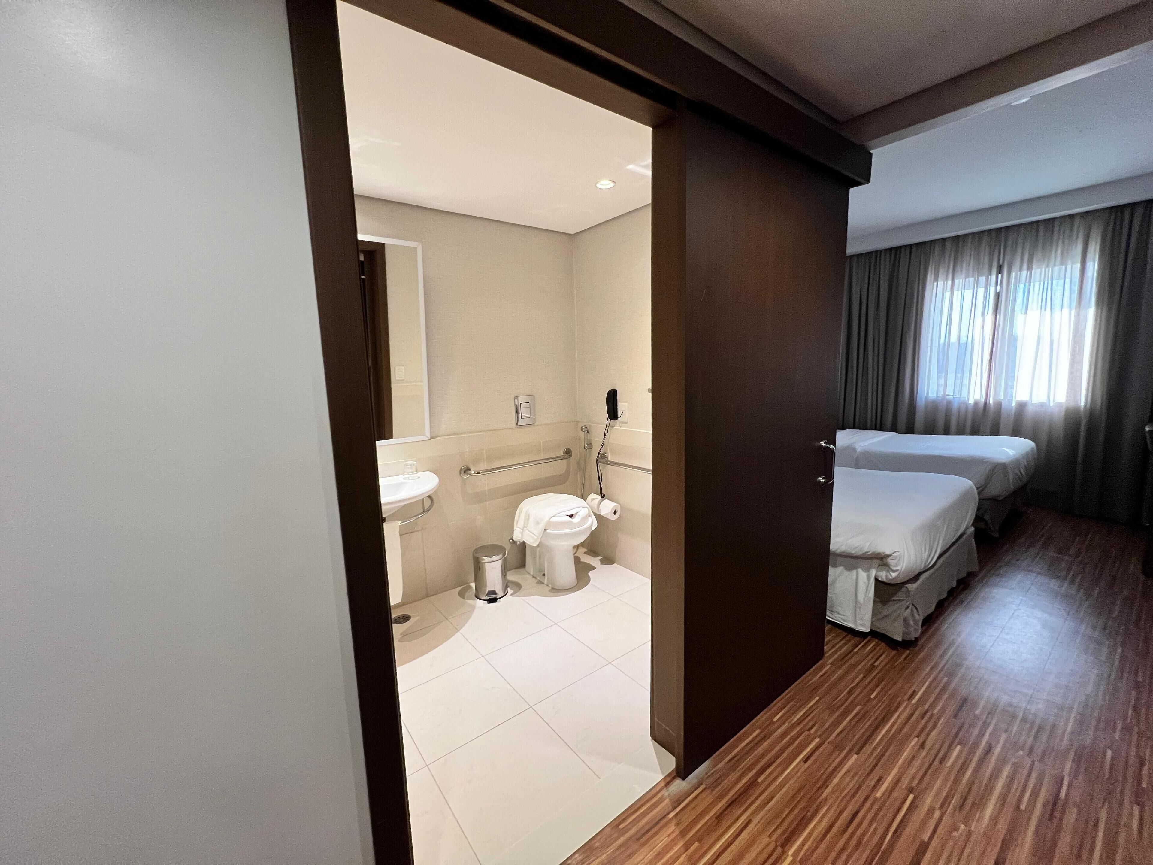 room, 2 single beds, mobility accessible | minibar, in-room safe, desk, blackout curtains