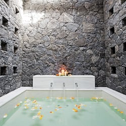 Separate tub and shower, designer toiletries, hair dryer, bathrobes