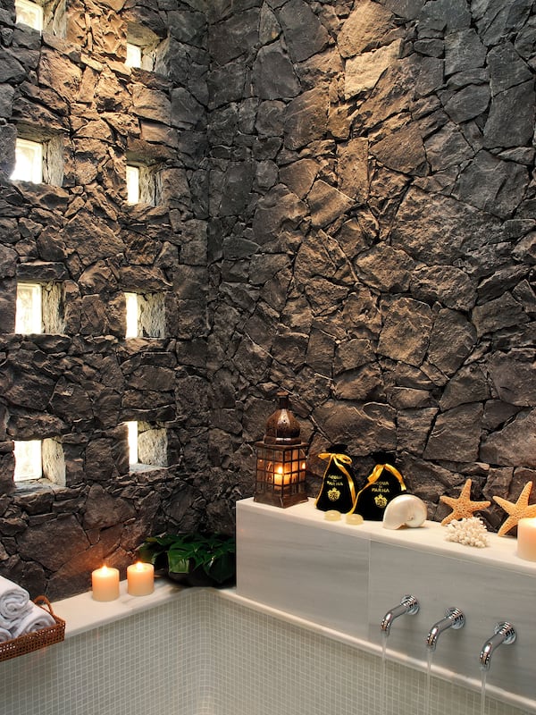 Separate tub and shower, designer toiletries, hair dryer, bathrobes