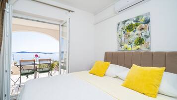 Kamar Double, patio, pemandangan laut | Seprai premium, tempat tidur bayi gratis, Wi-Fi gratis, dan seprai linen