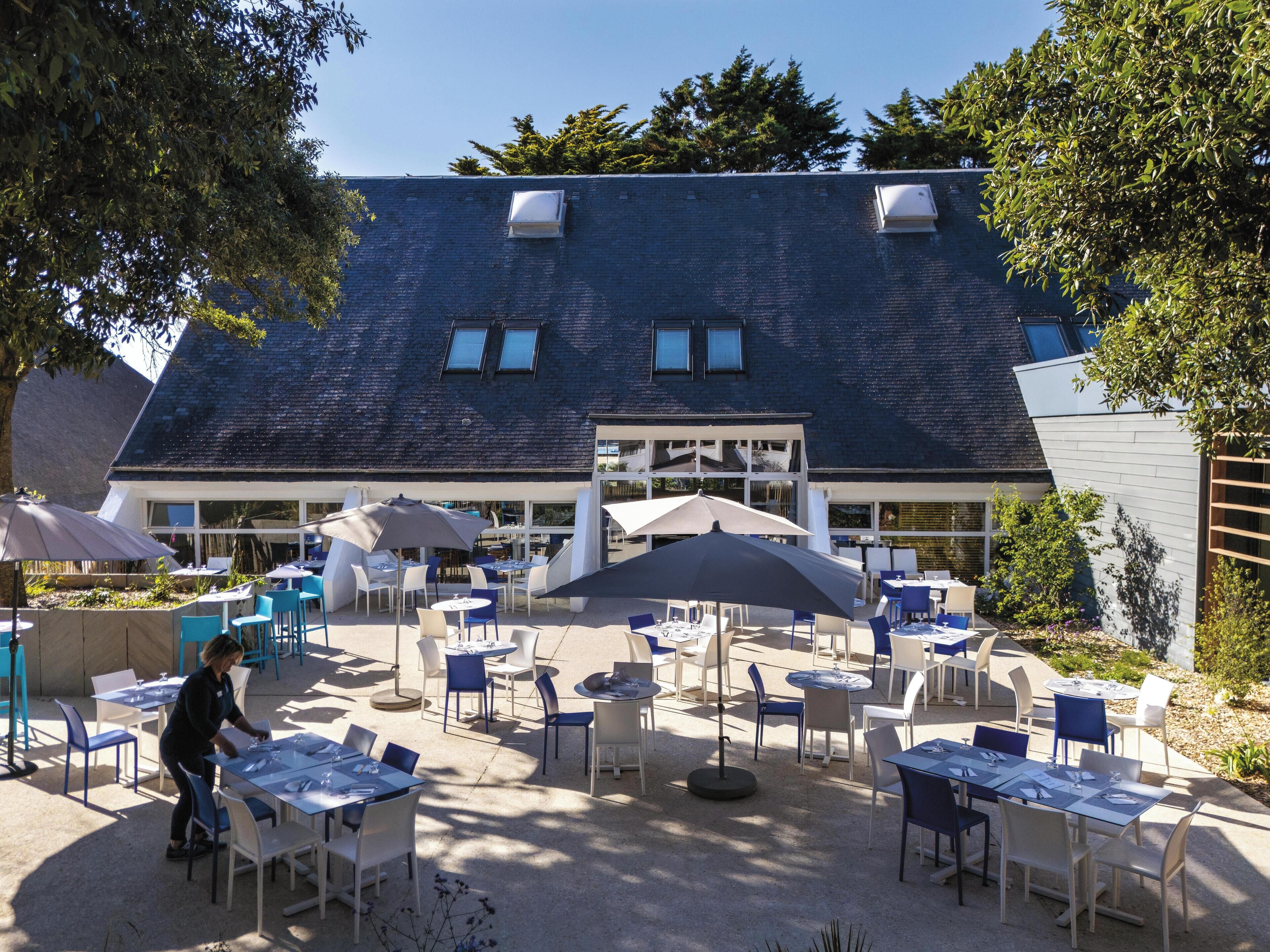 Breakfast, lunch, dinner served; local cuisine, alfresco dining 