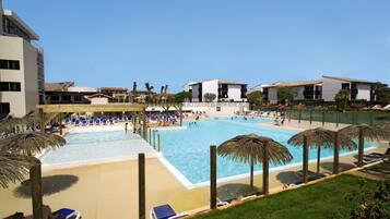 Seasonal outdoor pool, pool umbrellas, sun loungers