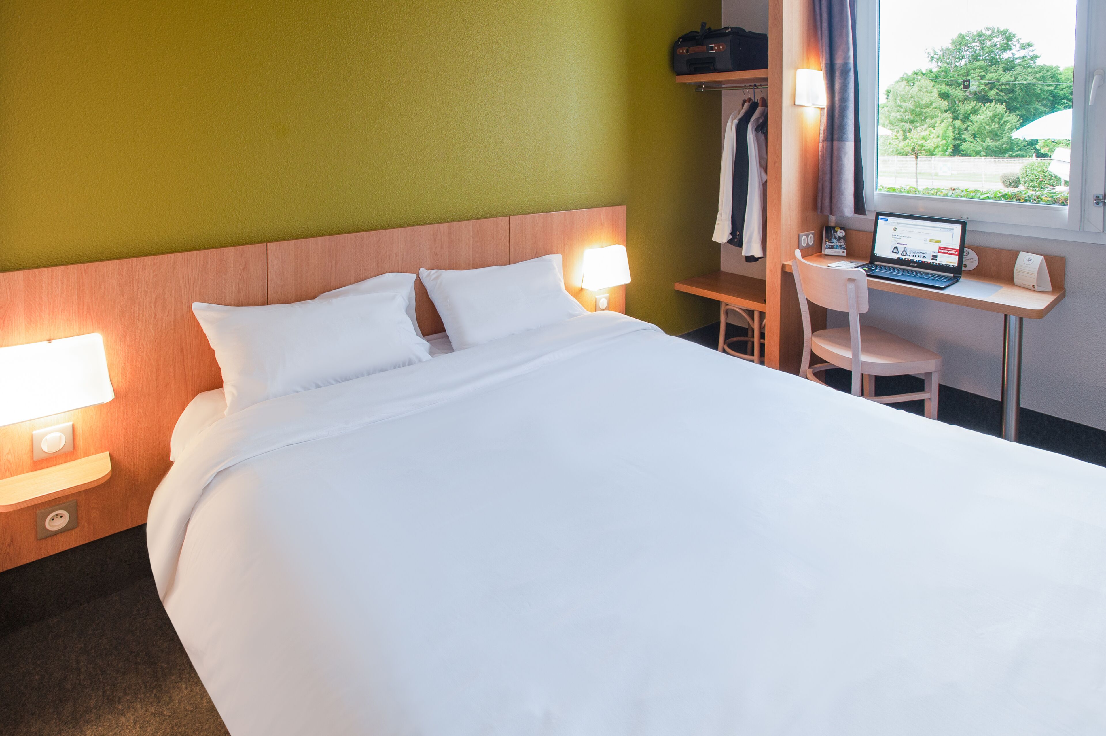 individually decorated, individually furnished, desk, blackout curtains