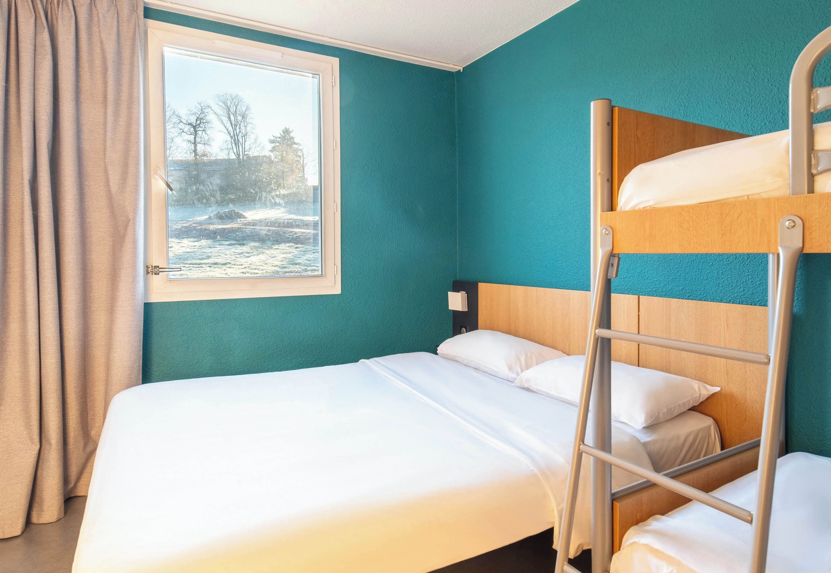 quadruple room, non smoking | individually decorated, individually furnished, desk, blackout curtains