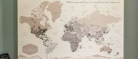 A world map with pins indicating locations.