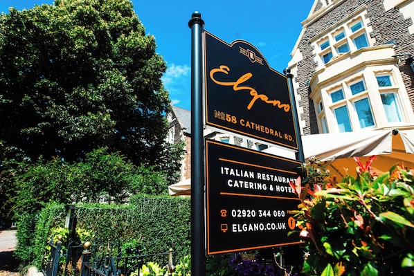 A sign for Elgano Cathedral Rd, No 58, Italian restaurant, catering, and hotel. - Elgano Guest House (Cardiff)