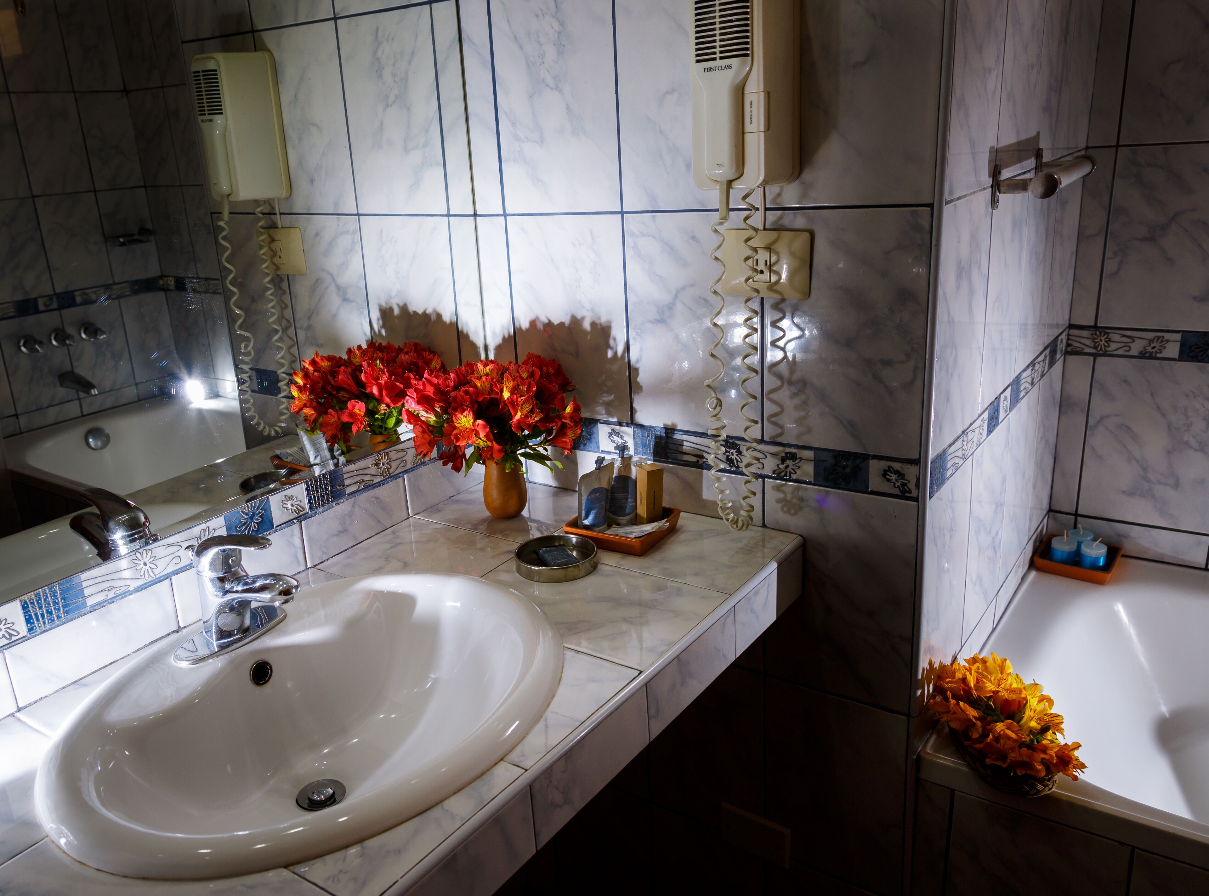 deluxe room, 1 king bed | bathroom sink