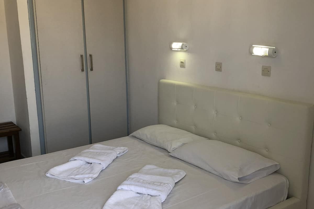 double room, garden view | in-room safe, iron/ironing board, free wifi, bed sheets