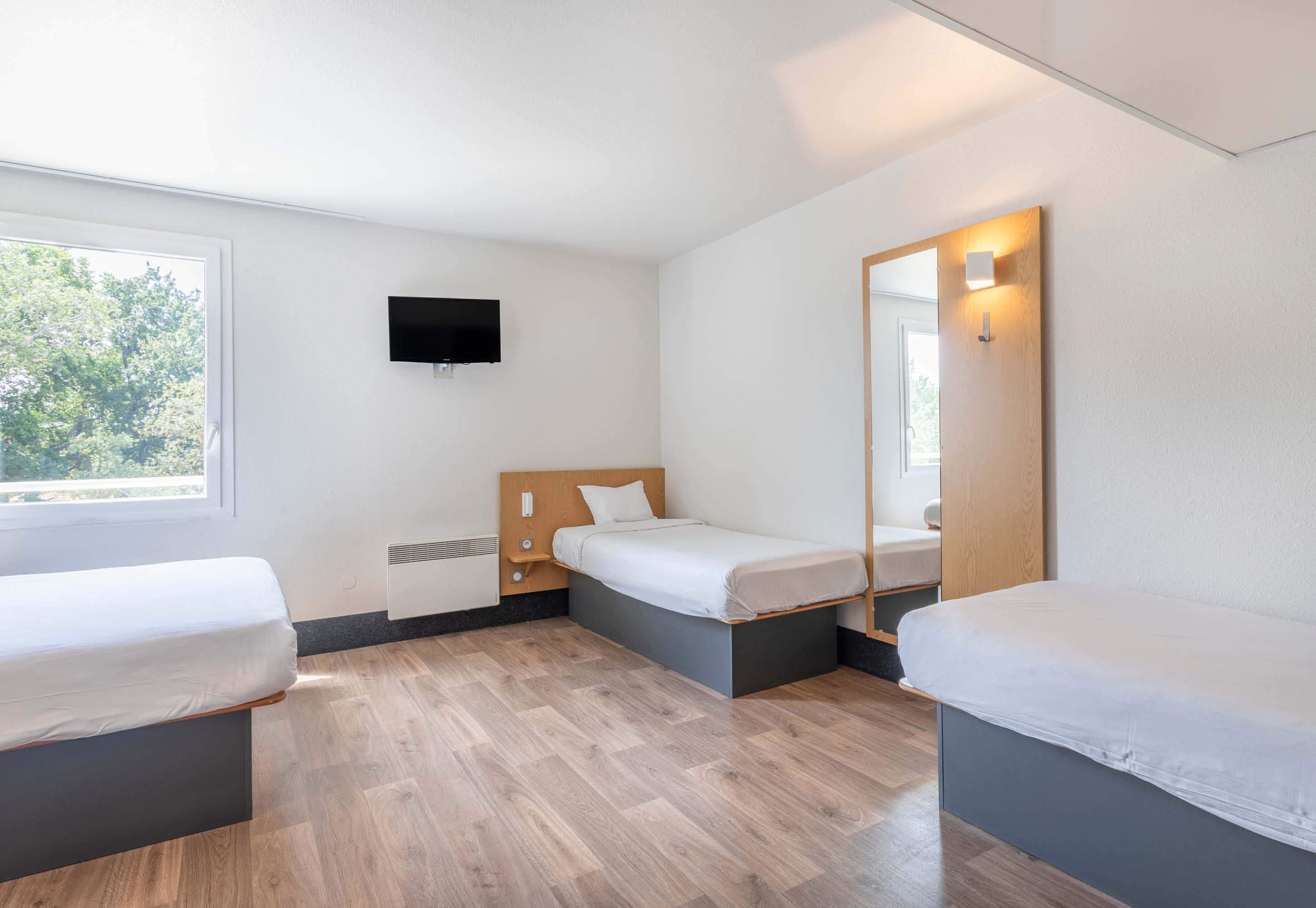 quadruple room, non smoking | 1 bedroom, premium bedding, desk, blackout curtains