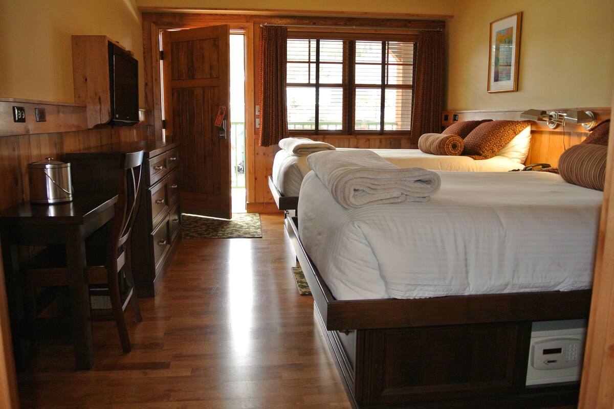 deluxe room, 2 double beds | in-room safe, desk, blackout curtains, iron/ironing board