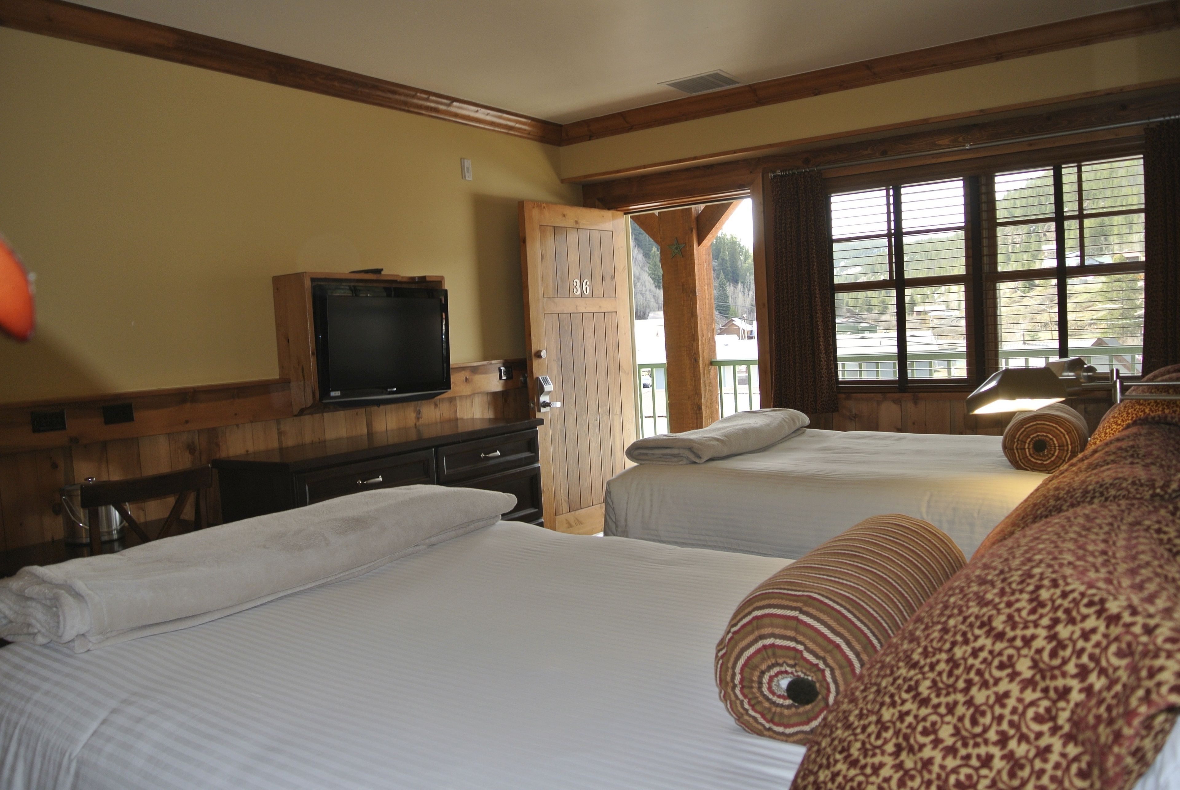 deluxe room, 2 double beds | in-room safe, desk, blackout curtains, iron/ironing board