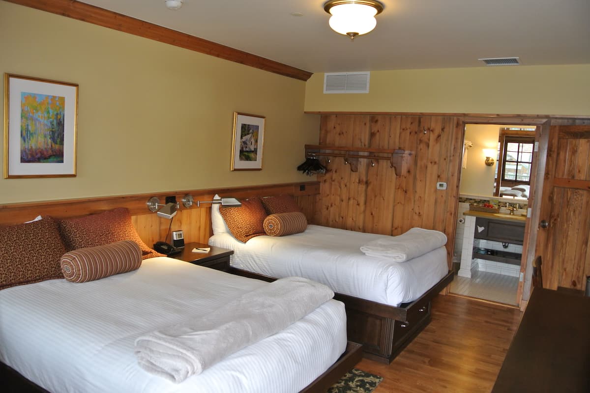 deluxe room, 2 double beds | in-room safe, desk, blackout curtains, iron/ironing board