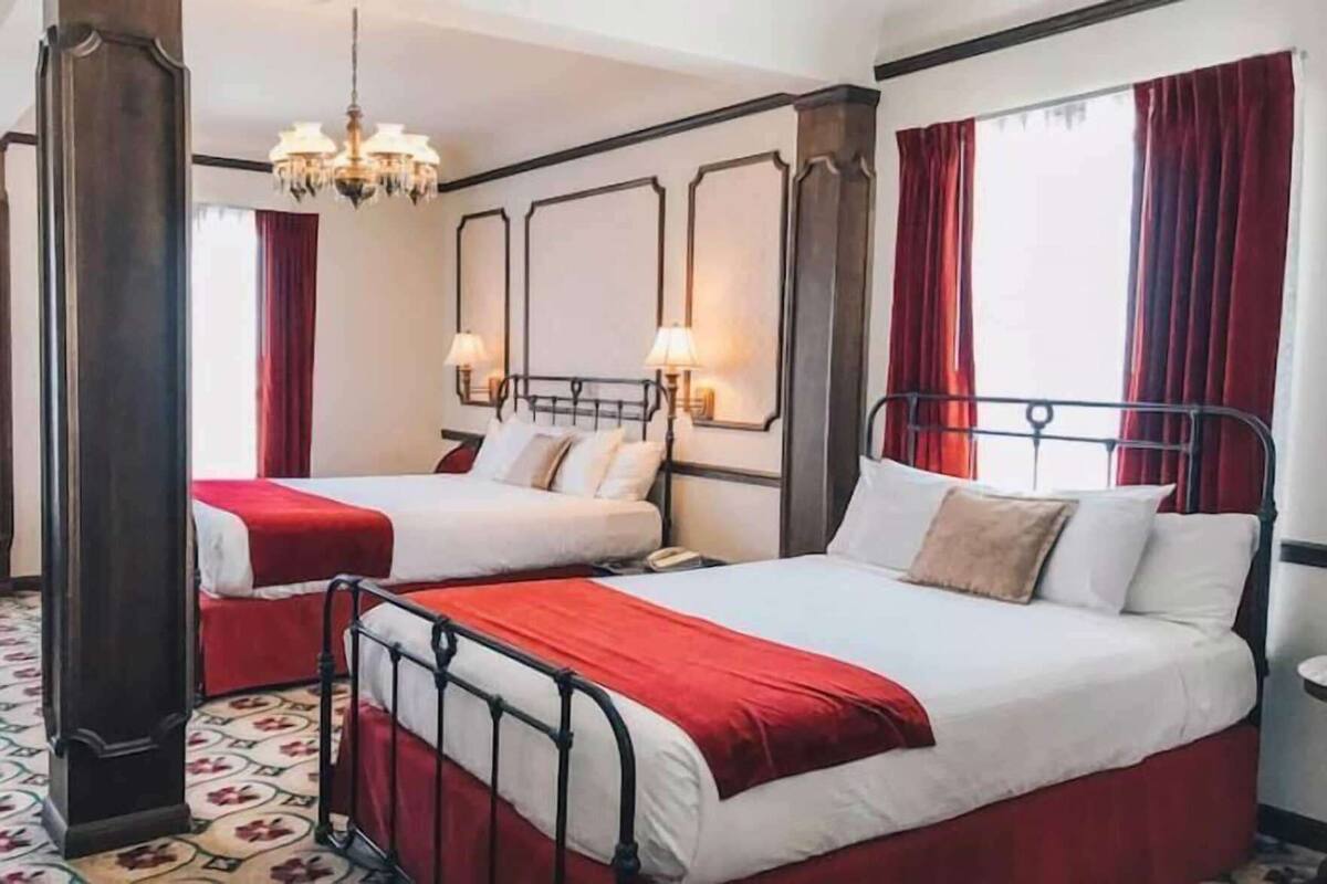 Premium bedding, blackout drapes, soundproofing, iron/ironing board