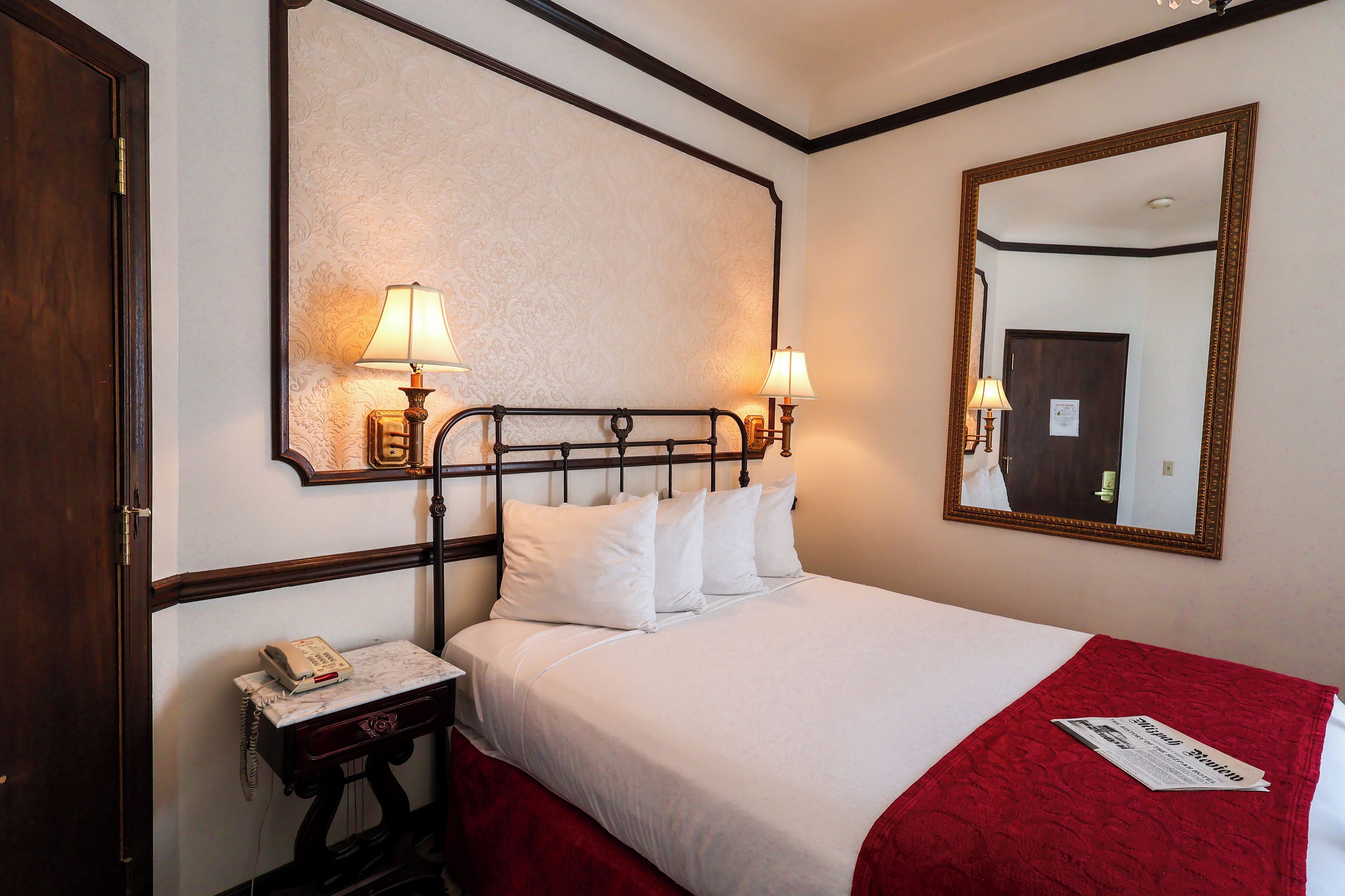 economy room, 1 queen bed | 1 bedroom, premium bedding, individually decorated, blackout curtains