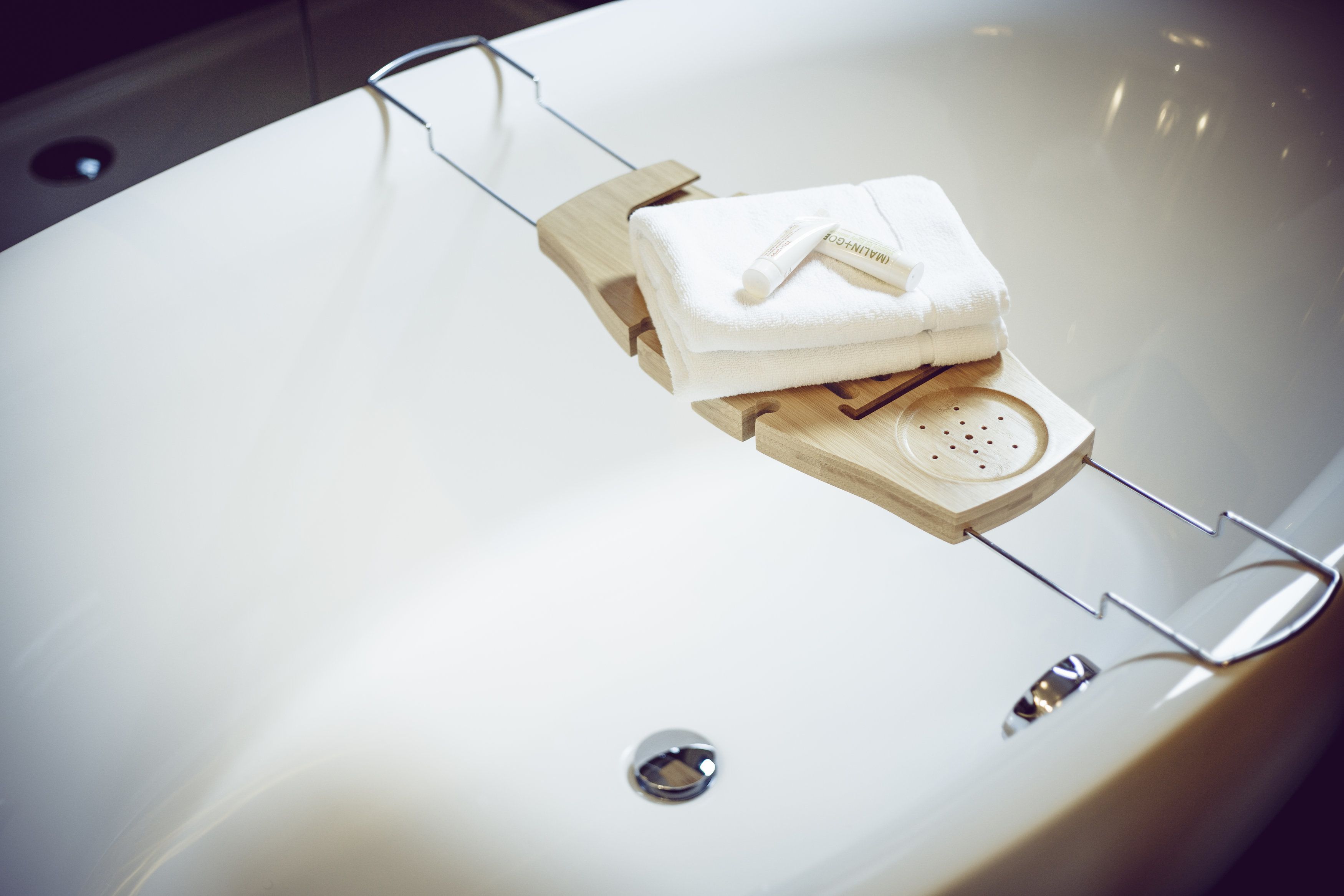 deluxe room, 1 king bed, city view, courtyard area (art deco room) | bathroom | shower, rainfall showerhead, designer toiletries, hair dryer