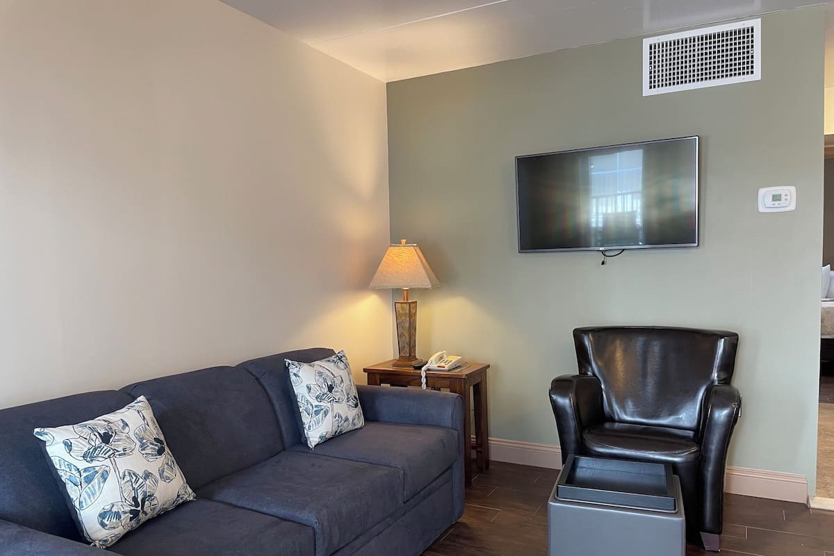 Family Suite, 1 Bedroom, Kitchenette | Living area | 42-inch LED TV with cable channels