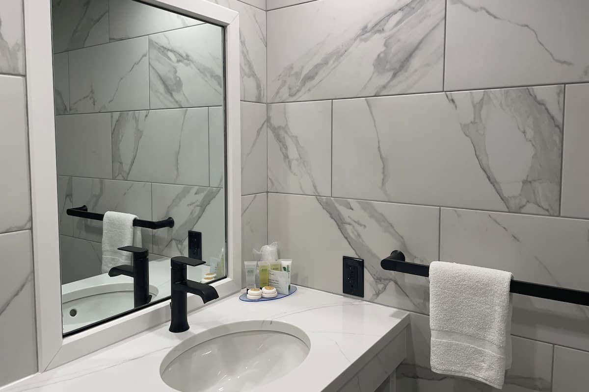 Family Suite, 1 Bedroom, Pool View (Two Double Beds with Kitchen) | Bathroom | Free toiletries, hair dryer, towels, soap
