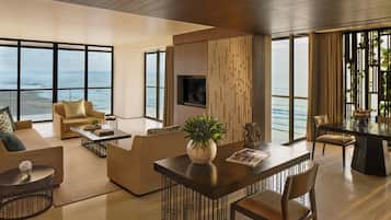 Suite (Beach) | Living area | 42-inch LED TV with cable channels, TV