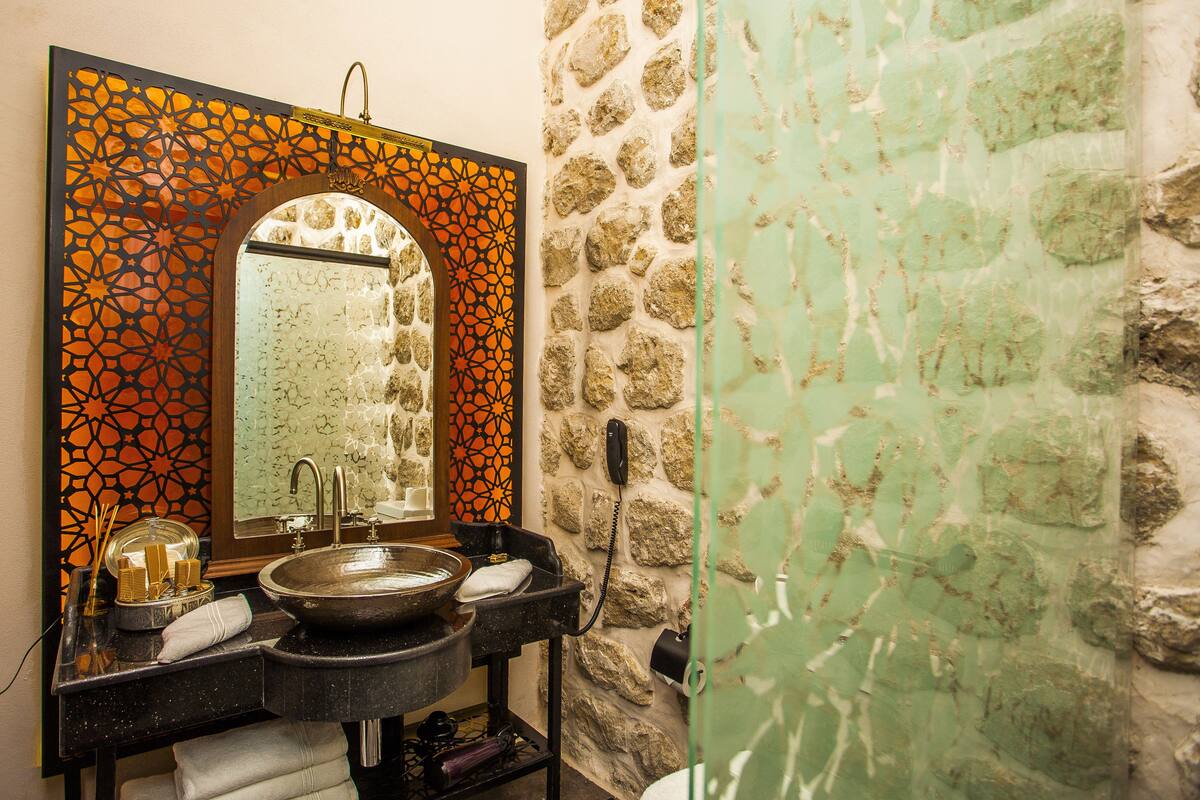 hair dryer, bathrobes, slippers, towels