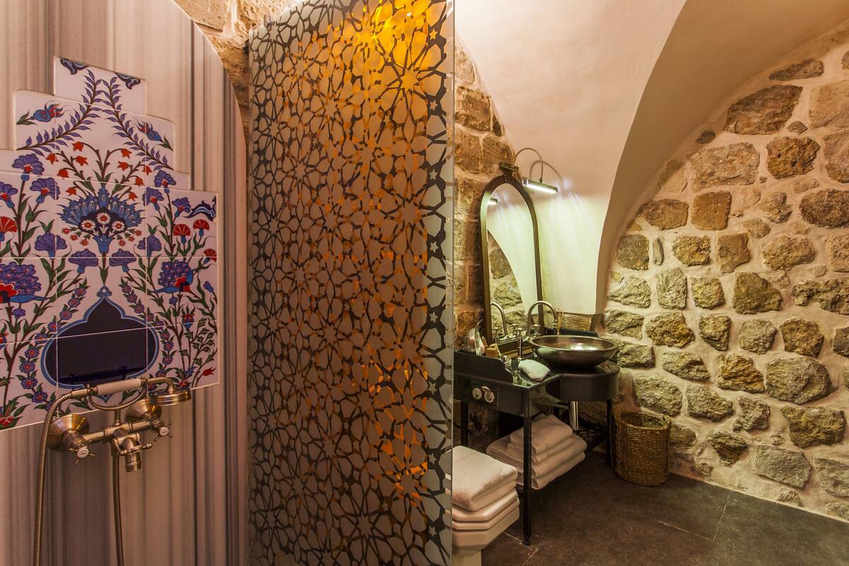 hair dryer, bathrobes, slippers, towels