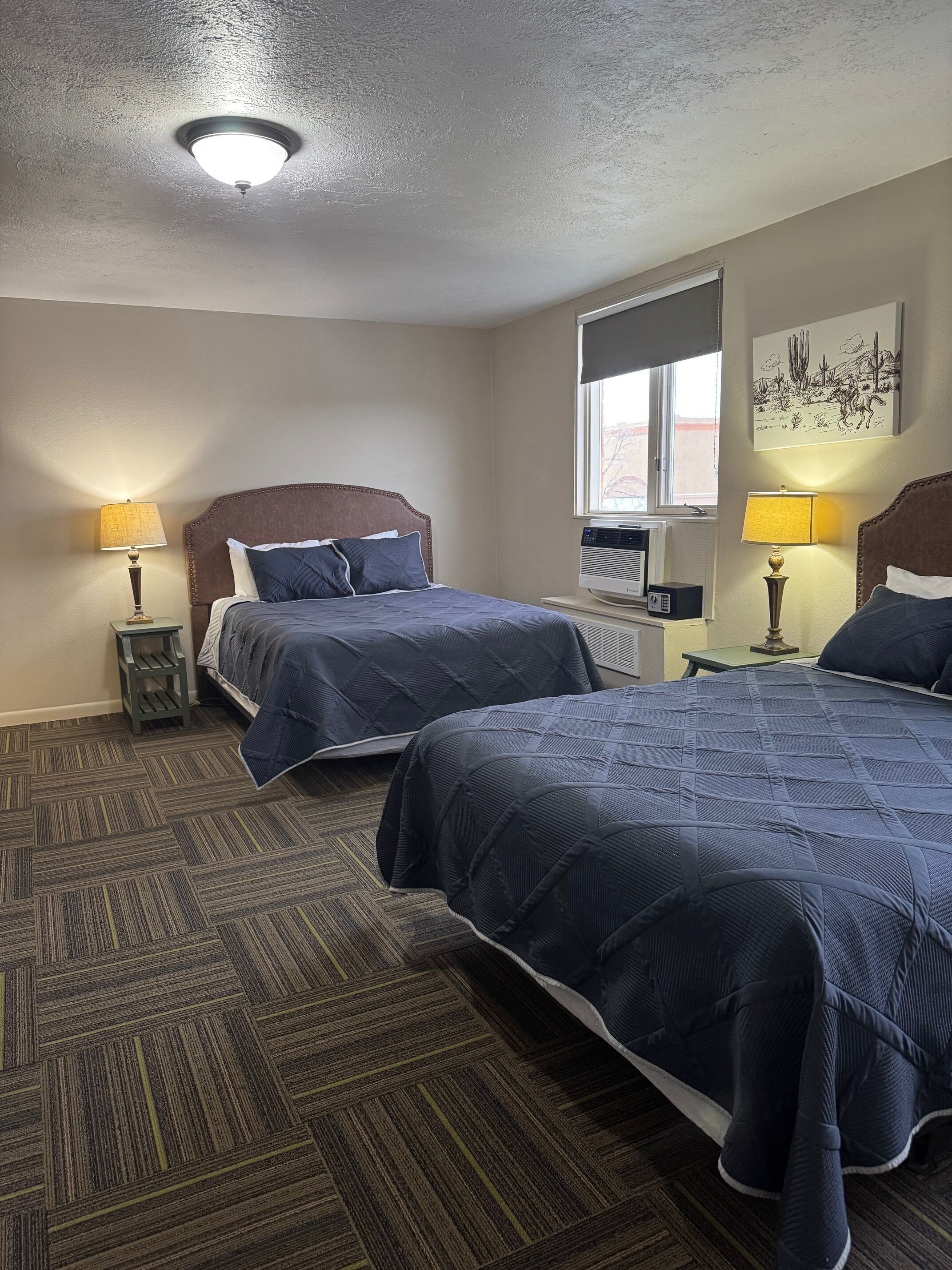 standard double room, 2 queen beds | in-room safe, desk, iron/ironing board, free wifi