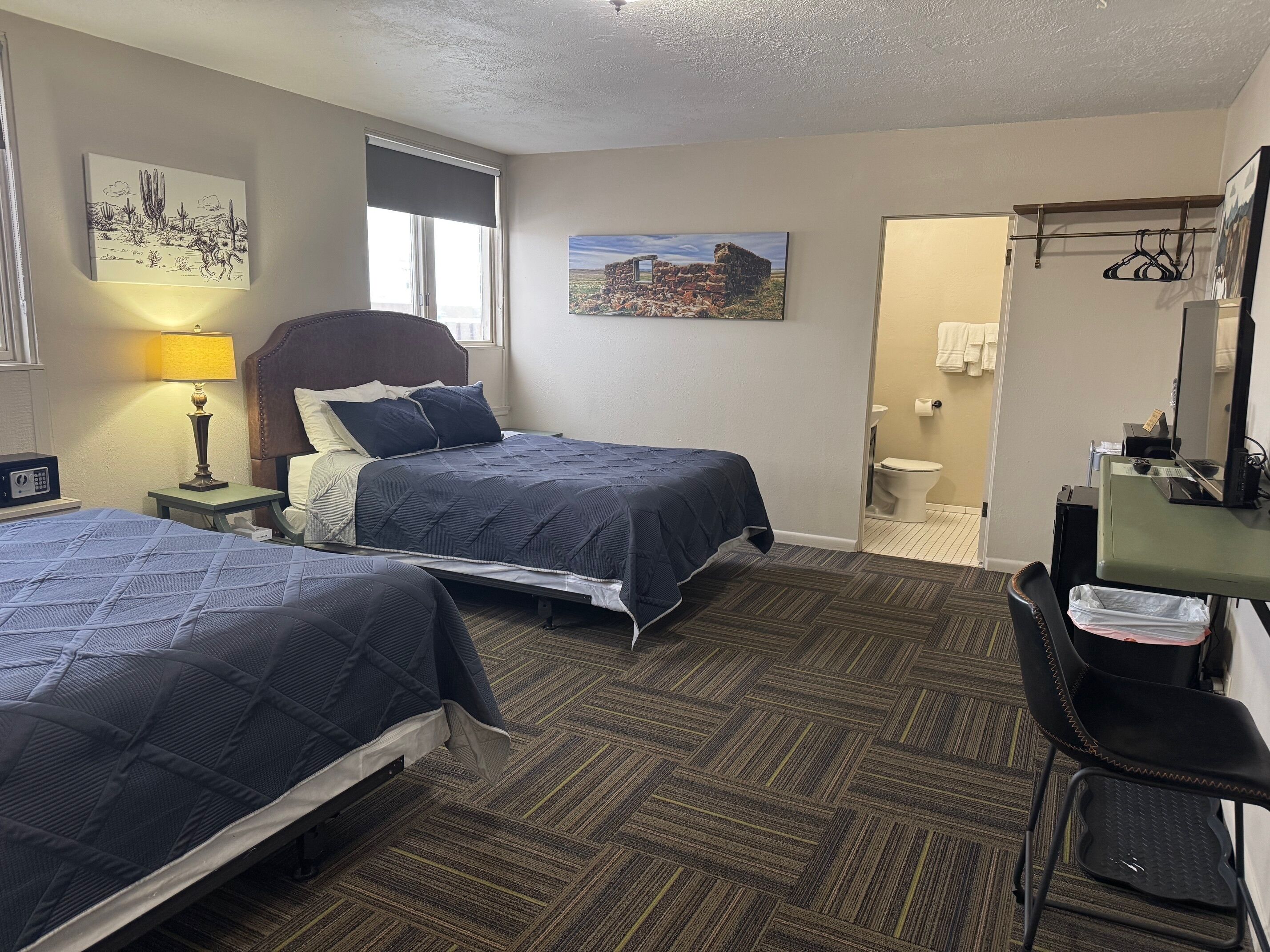 standard double room, 2 queen beds | in-room safe, desk, iron/ironing board, free wifi