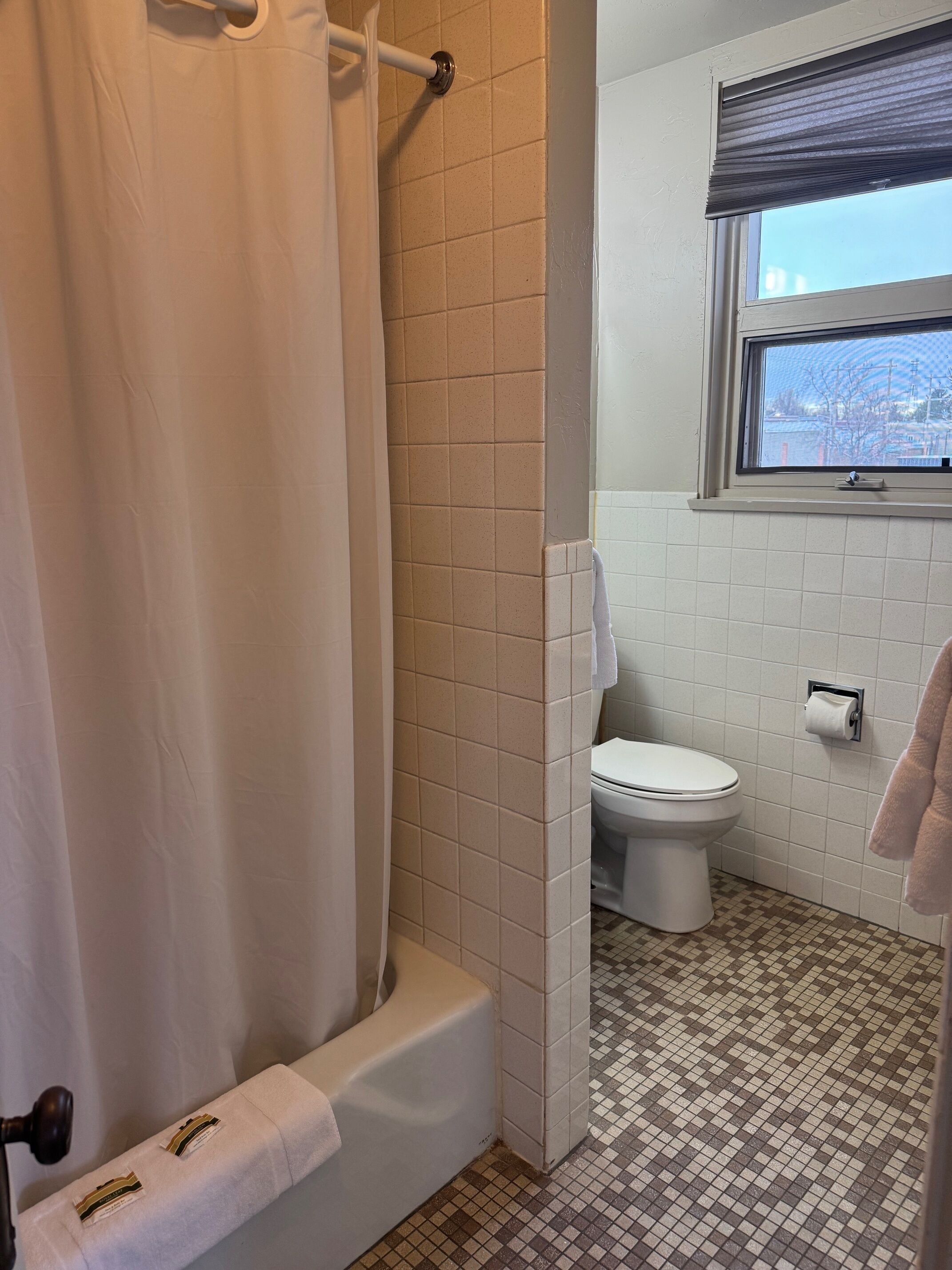 standard double room, 2 queen beds | bathroom | free toiletries, hair dryer