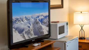 Deluxe Room, 2 Bedrooms (2 Queen Beds and 1 Queen Sofa Bed) | Living area | TV, DVD player