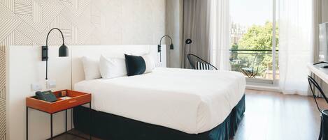 Habitación ejecutiva | Ropa de cama de alta calidad y minibar
