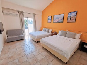 Family Quadruple Room, Balcony, Mountainside | Premium bedding, desk, free WiFi, bed sheets