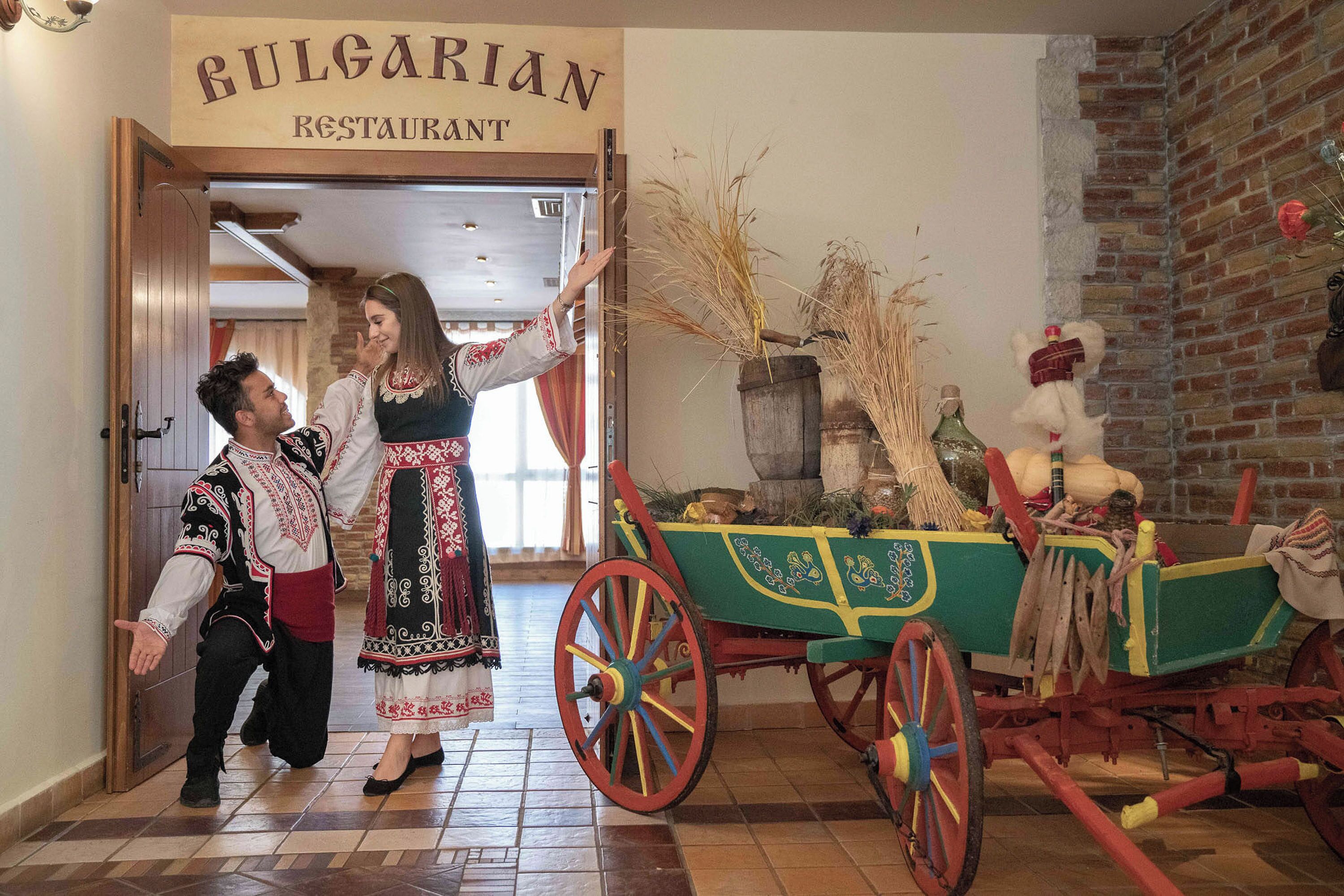 A restaurant entrance with a sign reading "BULGARIAN RESTAURANT".