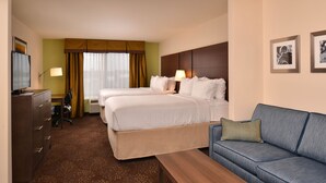 A hotel room with two beds, a sofa, a desk, and a television. - Holiday Inn Express & Suites Dearborn SW - Detroit Area by IHG (Dearborn)