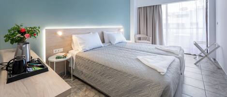 Deluxe Room, 2 Twin Beds | Minibar, desk, laptop workspace, iron/ironing board