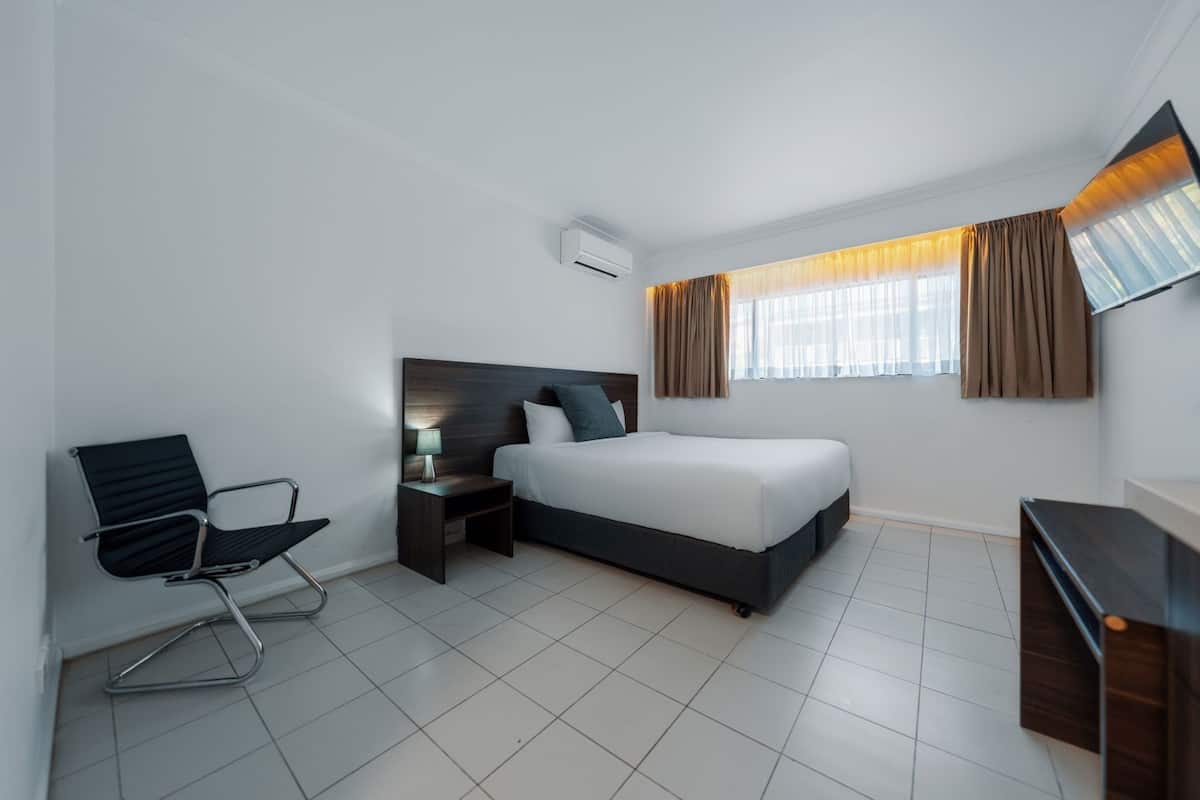 Premium bedding, pillow-top beds, desk, laptop workspace