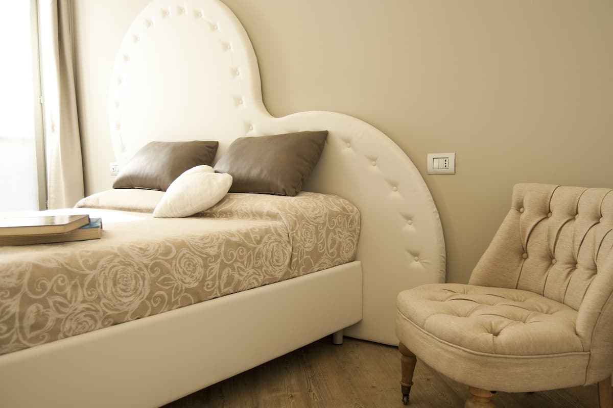 Premium bedding, down duvets, memory-foam beds, desk