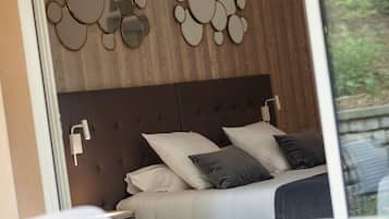 Minibar, décoration personnalisée, chambres insonorisées, lit parapluie