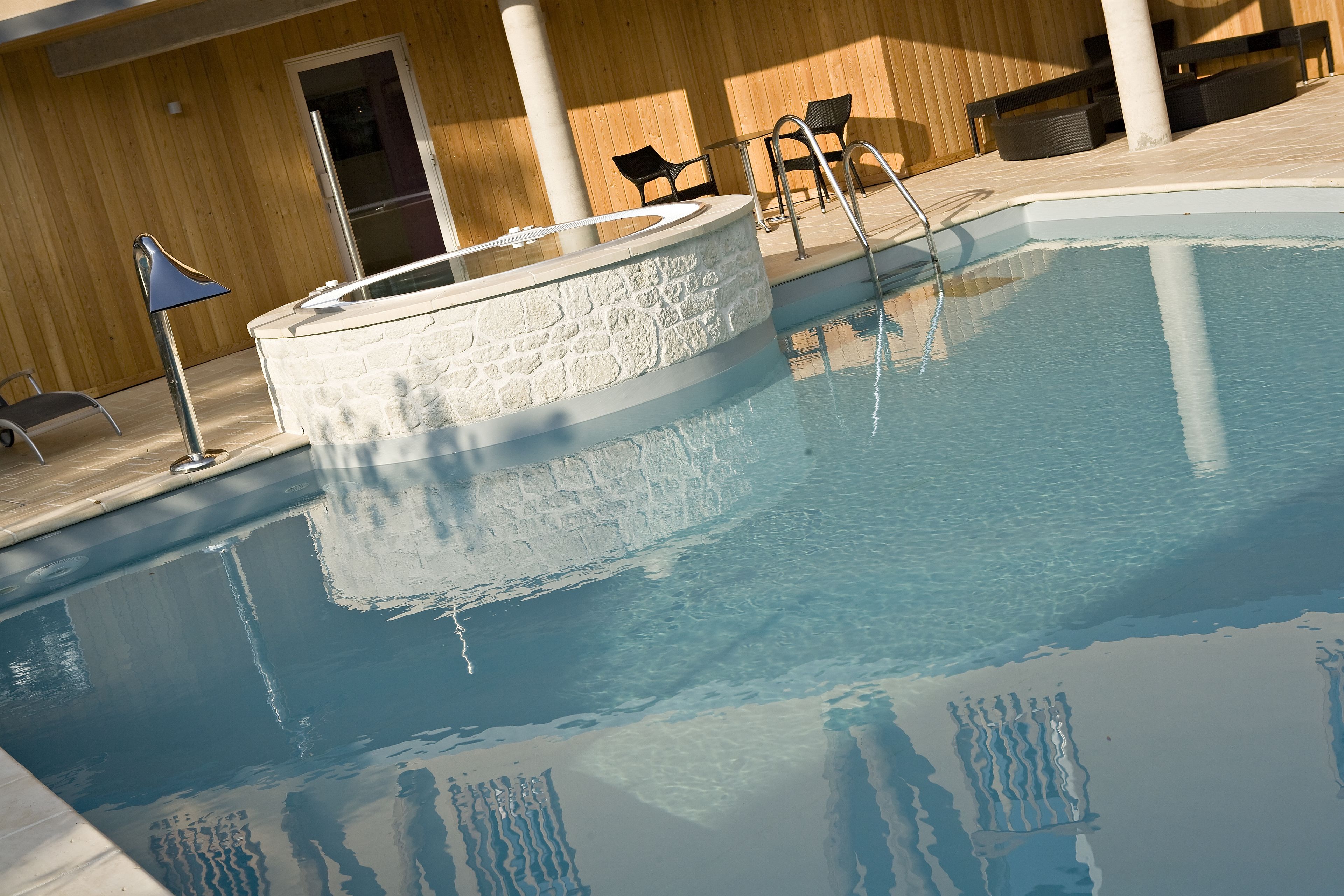 seasonal outdoor pool, open 9:00 am to 8:00 pm, pool umbrellas