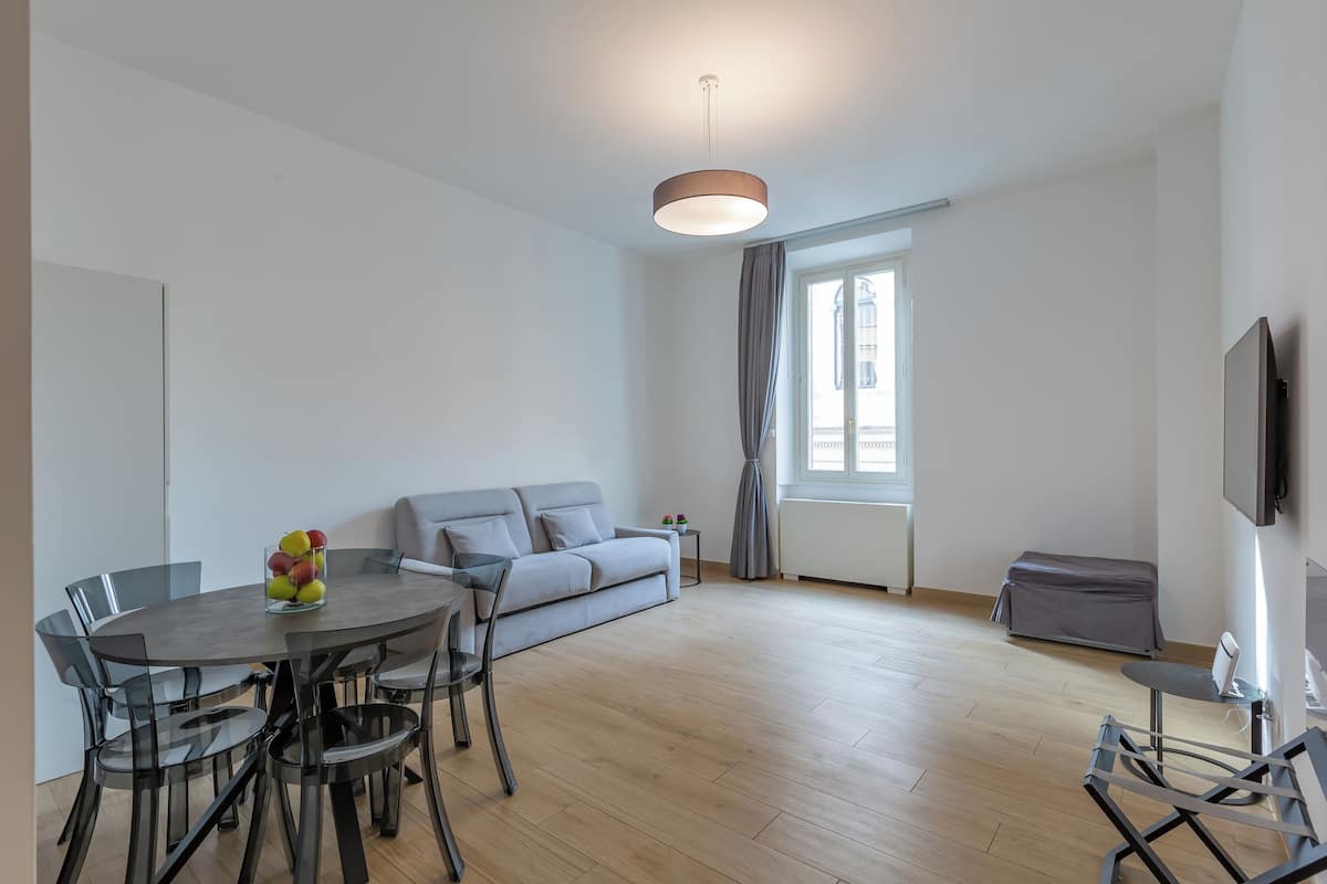 Standard Apartment | Living room | 30-inch flat-screen TV with digital channels, TV