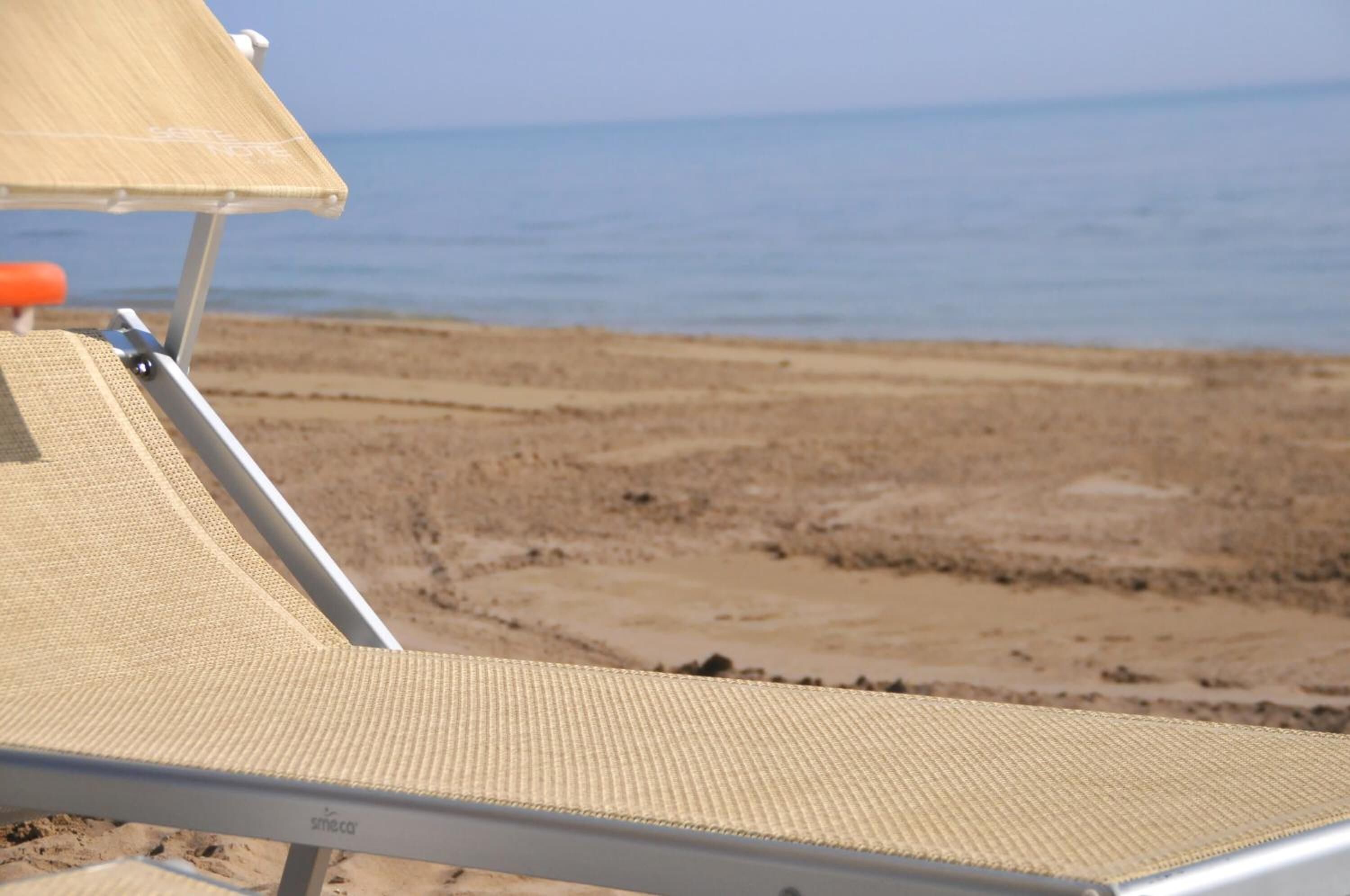 private beach nearby, white sand, sun-loungers, beach umbrellas