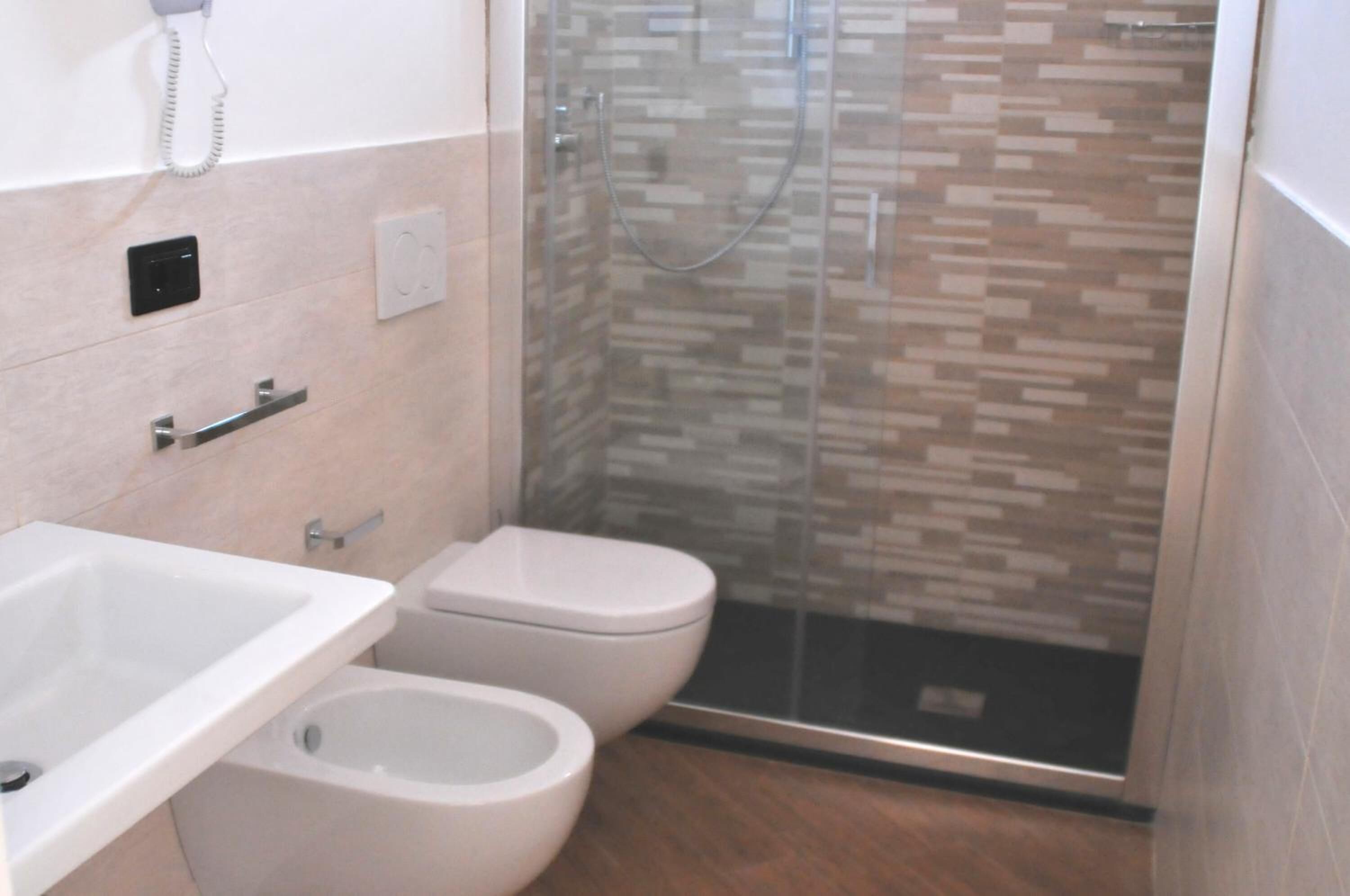 shower, free toiletries, hair dryer, bathrobes