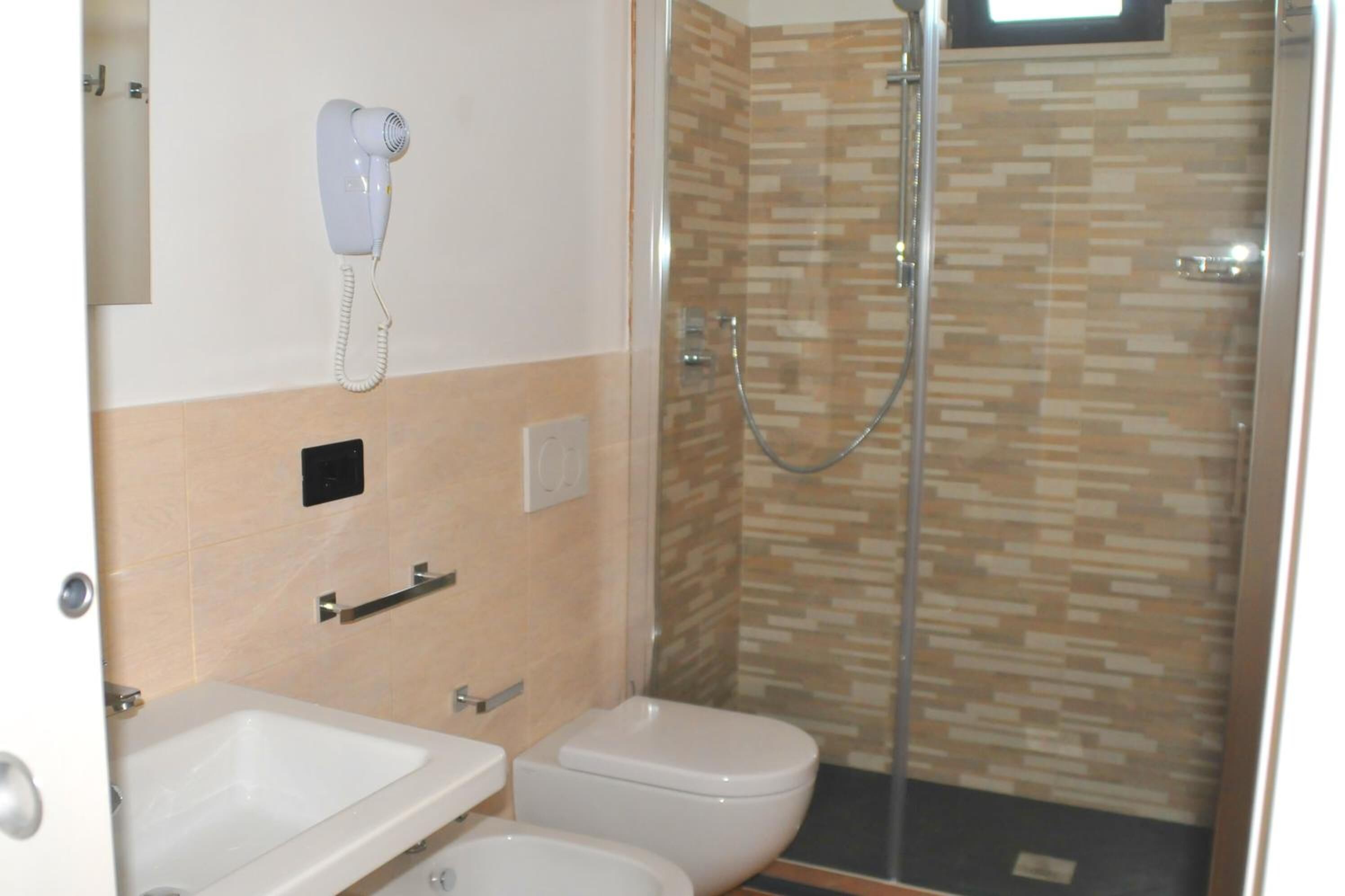 shower, free toiletries, hair dryer, bathrobes