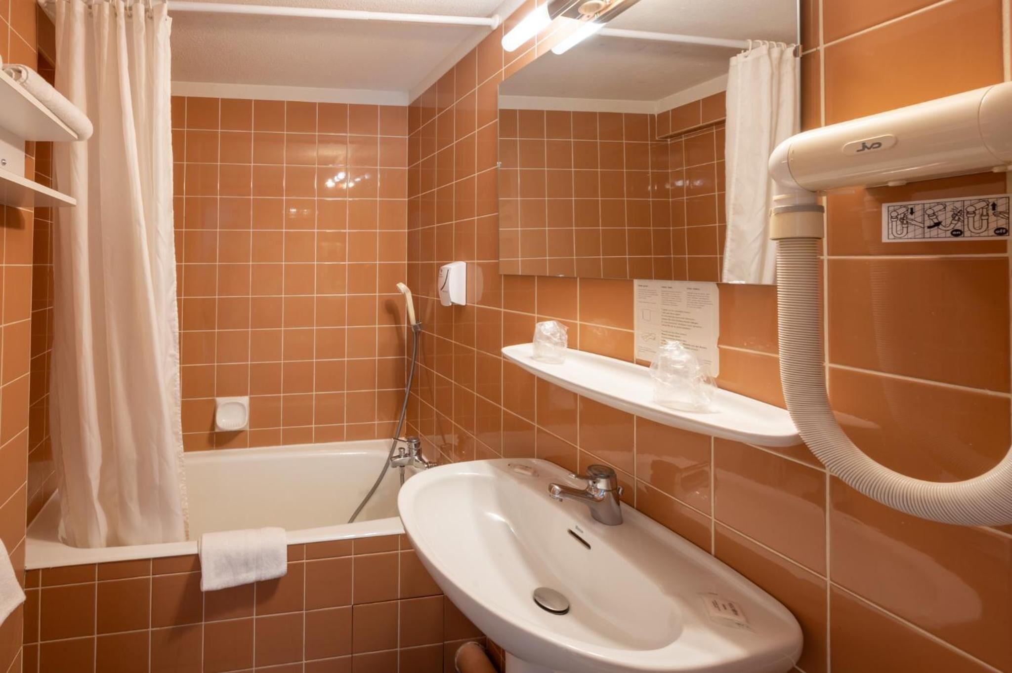 free toiletries, hair dryer, towels