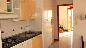 Apartment, 1 Bedroom (4 pax) | Private kitchen | Fridge, stovetop, cookware/dishes/utensils