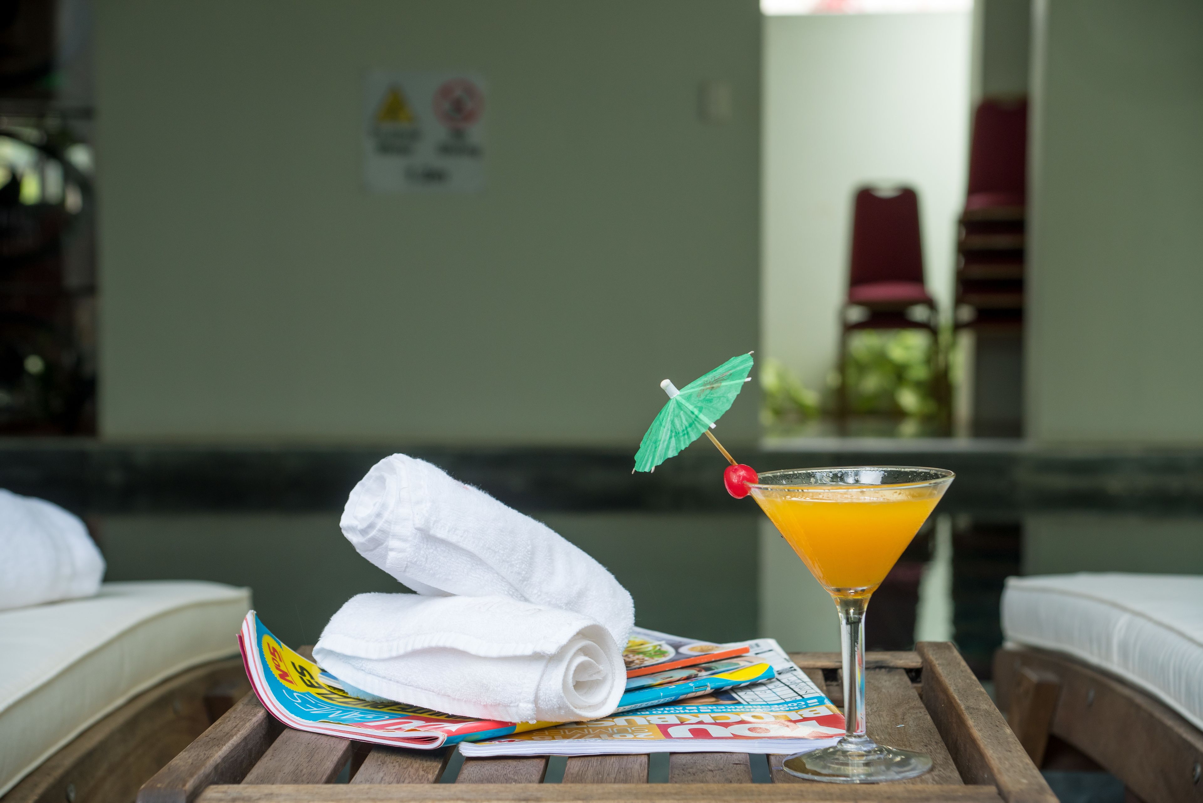 indoor pool, pool umbrellas, pool loungers