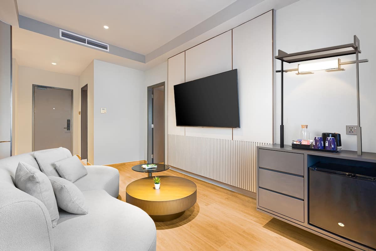 Suite – executive | Oppholdsområde | Flatskjerm-TV